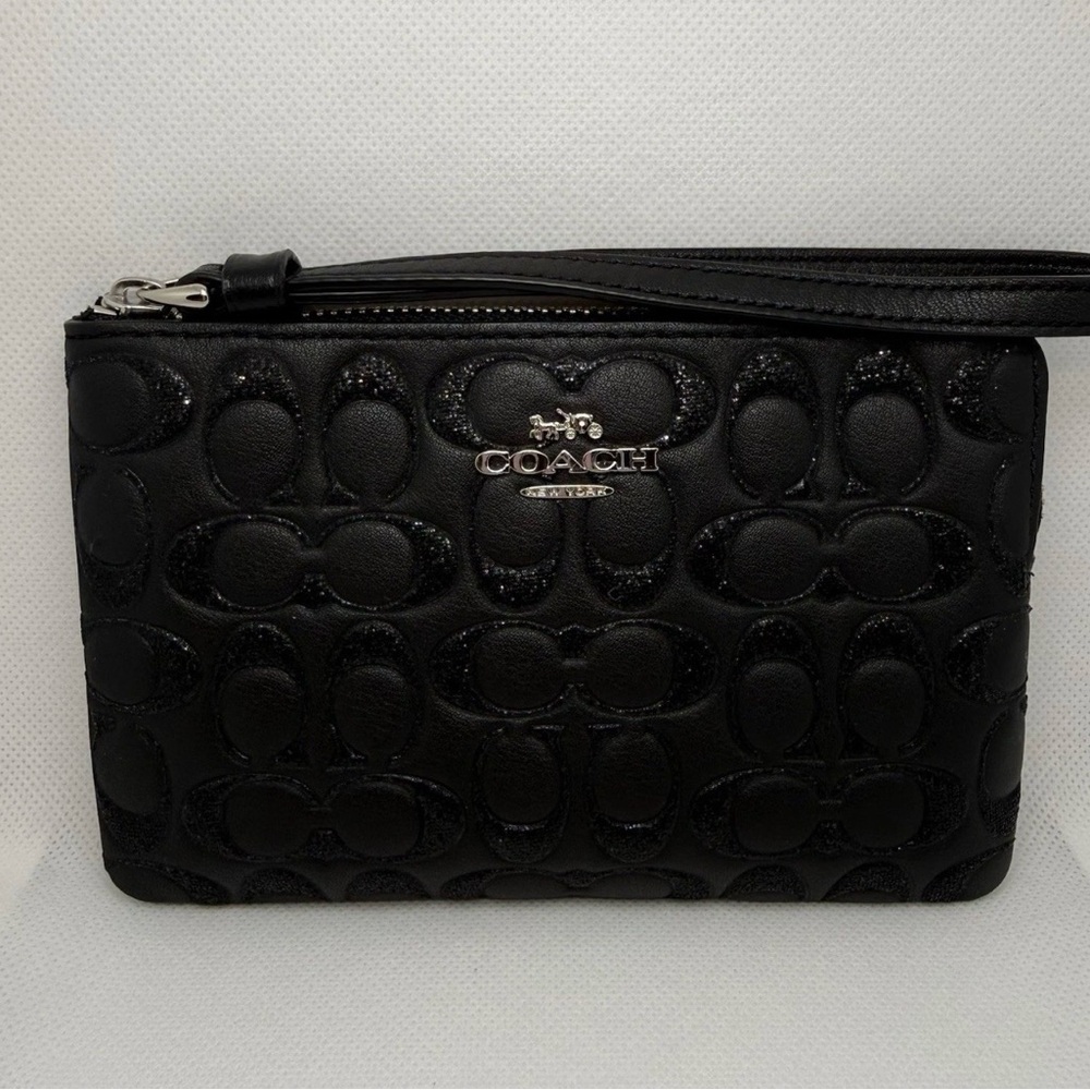 Coach Black sparkling C Embossed Leather Wristlet NWT, papers and box.